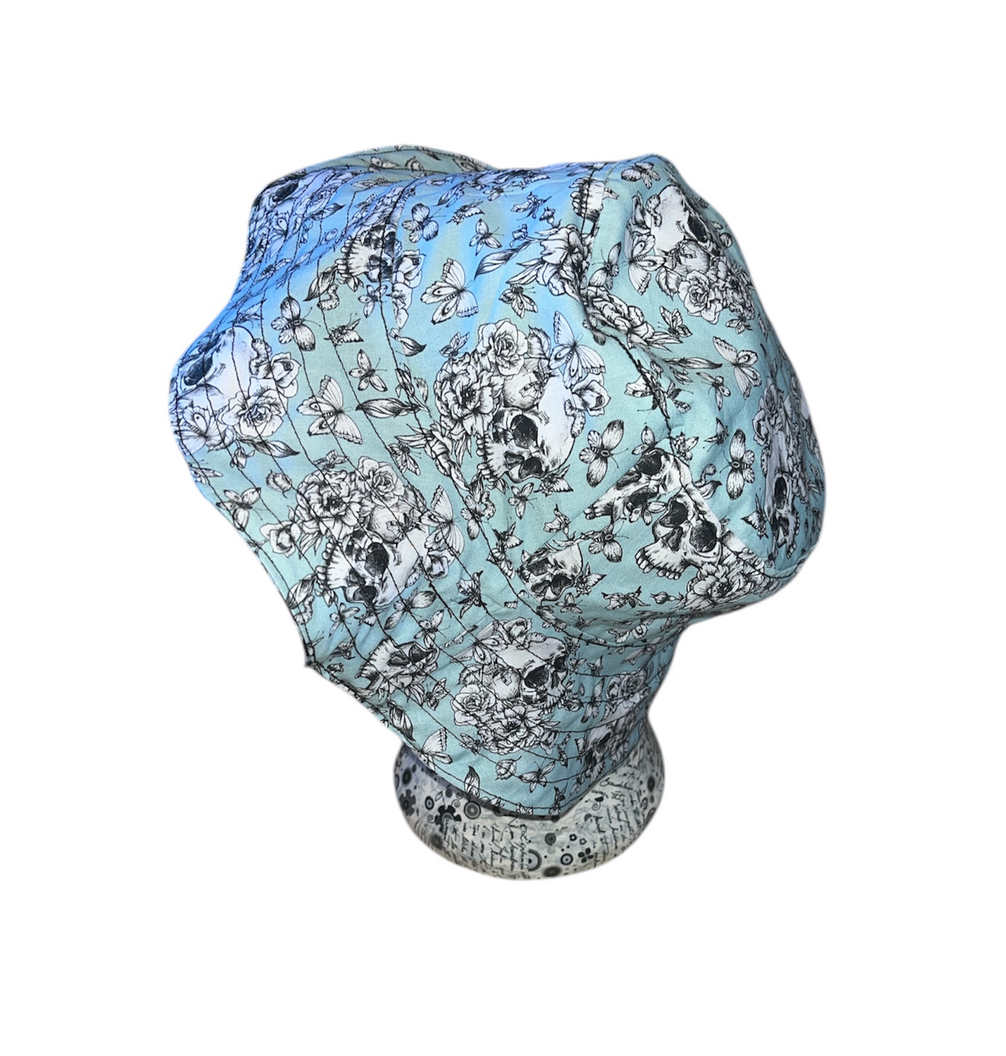 Reversible skull and rose bucket hat