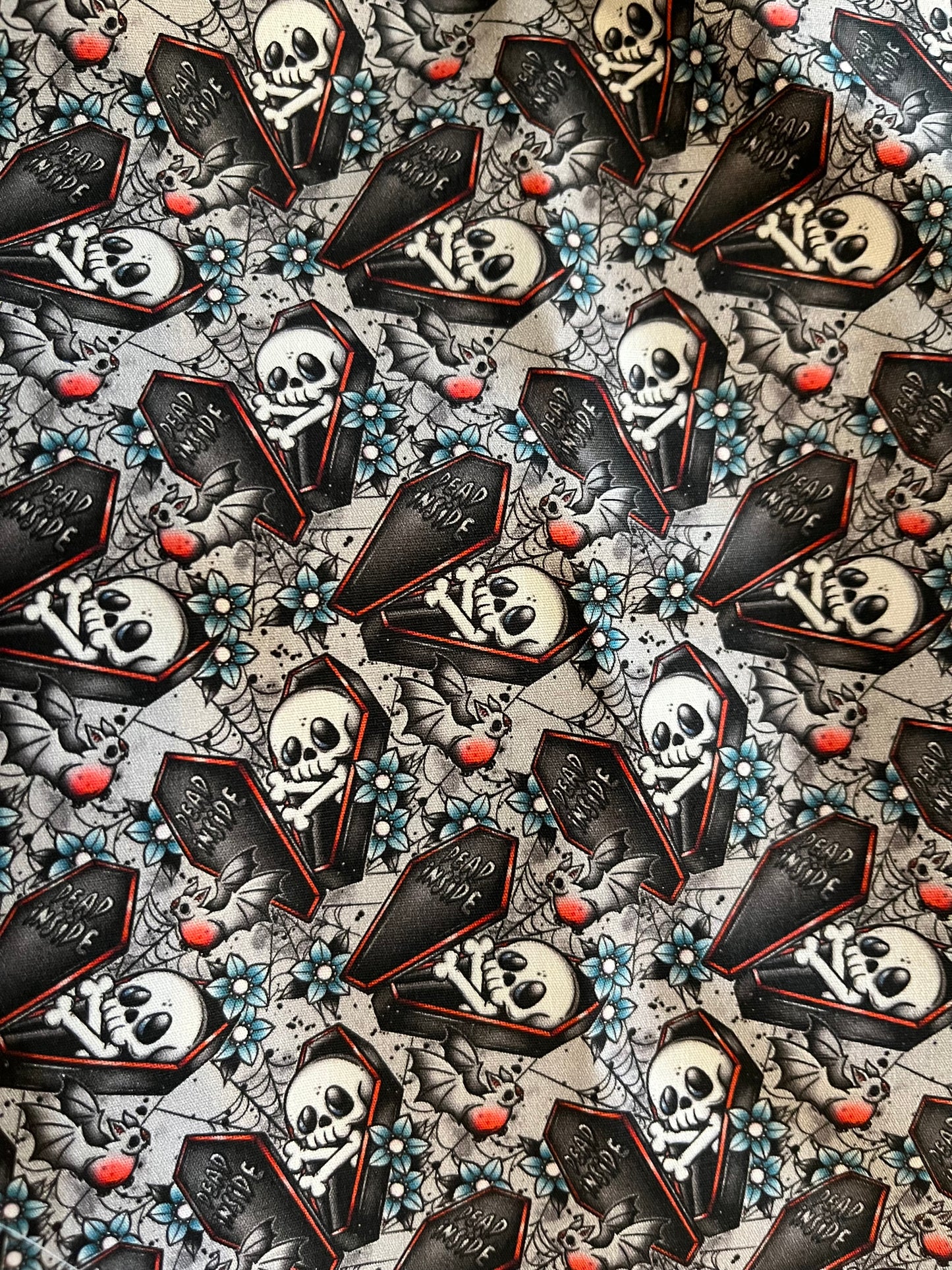 Dead inside skull in coffin Scrunchie
