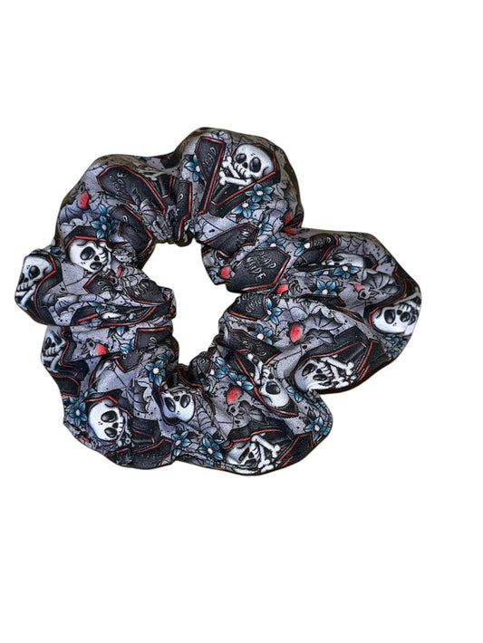 Dead inside skull in coffin Scrunchie